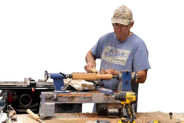 Craftsman building wooden rocking horse seahorse at Fish City Woodworks